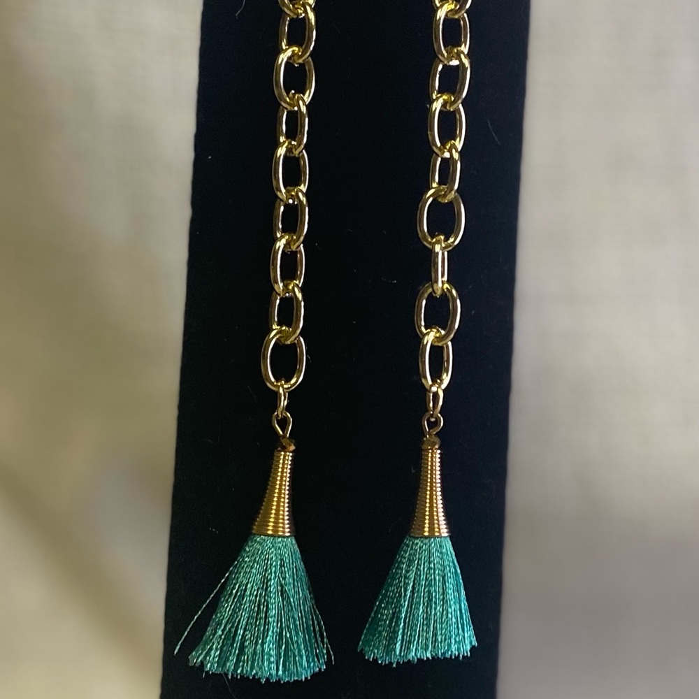 Green Tassel chain earrings.